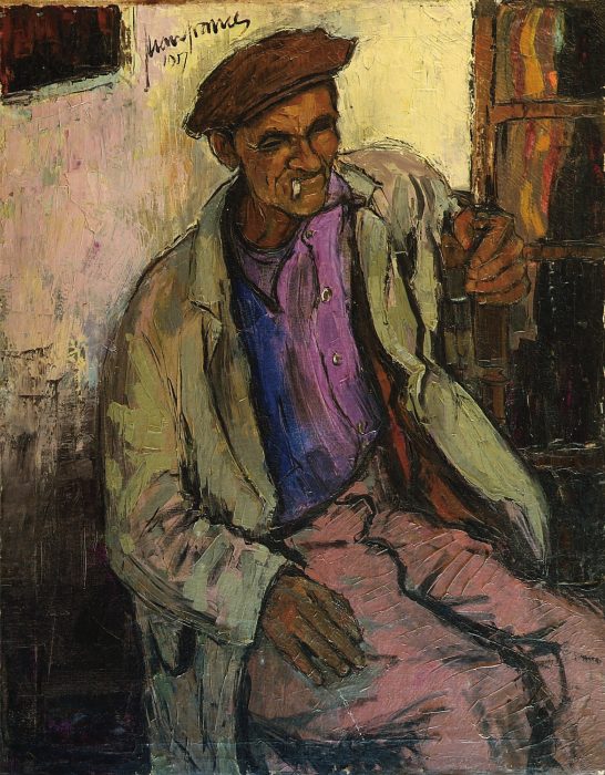 Retrato de un hombre sentado, con una chaqueta clara y boina, con un fondo poco definido.