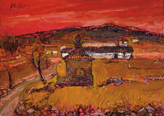 Paisaje con un cielo rojo intenso, casas blancas y un camino en el campo.